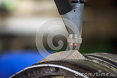 Hard surfacing by submerge arc welding process Stock Photo