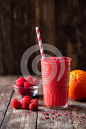 Hard to resist freshly blended citrus and berry fruit smoothie Stock Photo