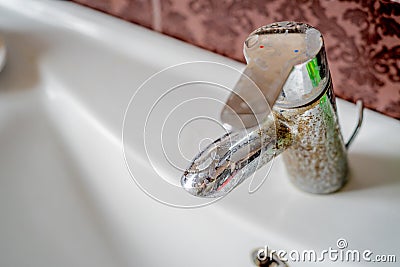 Hard water deposit on a tap Stock Photo