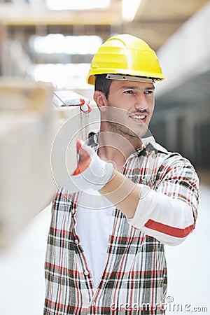 Hard worker on construction site Stock Photo