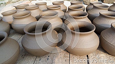 Drying earthen pots in sunlight. Stock Photo