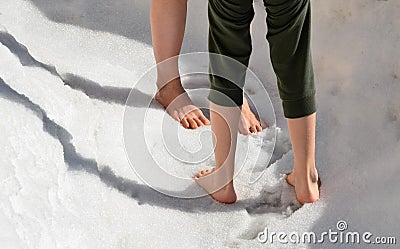 Hardening from a small baby is important for contact with the elements and the creation of immunity and thermoregulation. walking Stock Photo