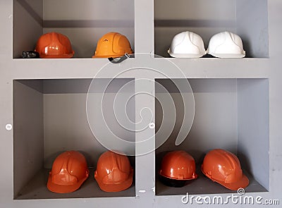 Yellow work vests are hanging on a hanger Stock Photo