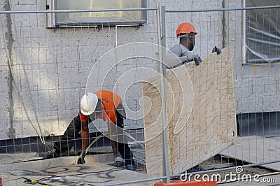 HARDING WORKING MALES Editorial Stock Photo