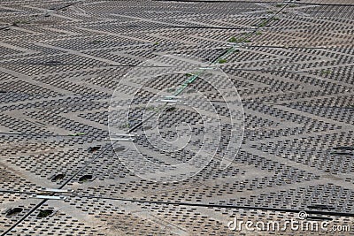 Hardstanding over grass with zig zag design - image Stock Photo