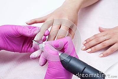 Hardware manicure. Removal of old gel varnish Stock Photo