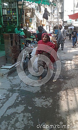 This is a hardworking Pakistani cute girl. Editorial Stock Photo