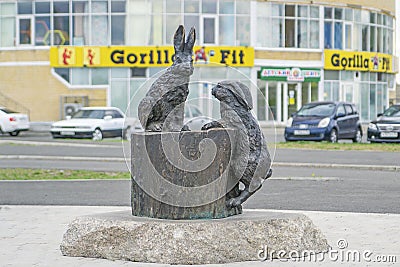 Hares on a stump, Bronze monument Editorial Stock Photo