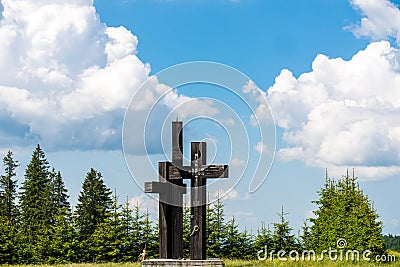 Three black crosses at roadside with visible name of Marton Aron former Catholic bishop of Transylvania. Editorial Stock Photo