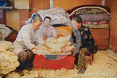 Senior Mongolian women produce felt in Harhorin, Mongolia. Editorial Stock Photo