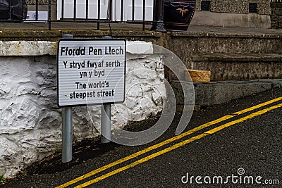 Editorial, Sign for Ffordd Pen Llech, now second steepest street in world. Barmouth, Gwynedd, North Wales, UK Editorial Stock Photo
