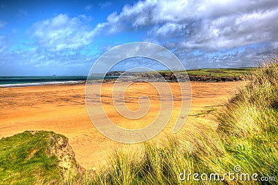Harlyn Bay beach North Cornwall England UK near Padstow and Newquay in colourful HDR with cloudscape Stock Photo