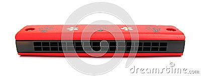 Harmonica mouth organ red for children Stock Photo