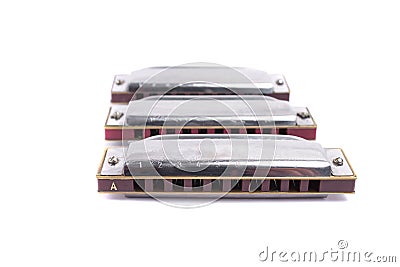 Harmonicas, french harps or mouth organs isolated on white Stock Photo