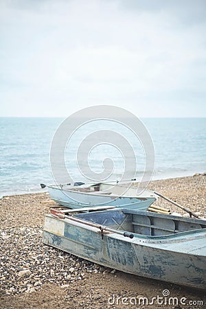 Harmony coastline landscape life balance decrepit old rusted boat at seashore spiritually sea beach Stock Photo