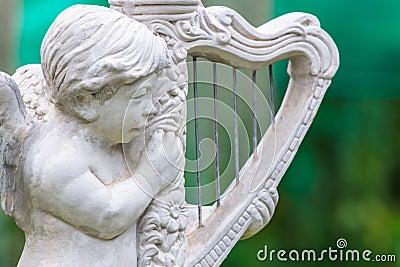 Harp cupid Stock Photo