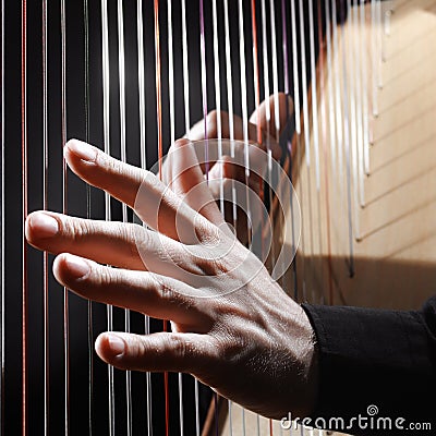 Harp hands Stock Photo