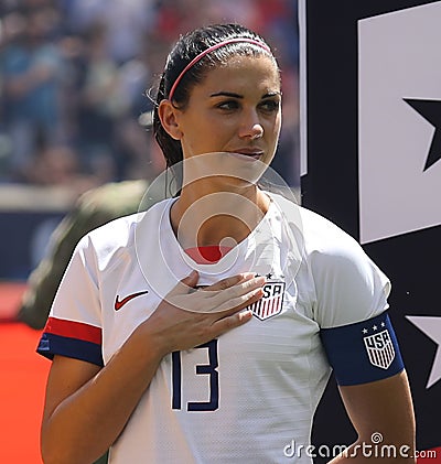 U.S. Women`s National Soccer Team captain Alex Morgan #13 during National Anthem before friendly game against Mexico Editorial Stock Photo