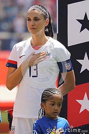 U.S. Women`s National Soccer Team captain Alex Morgan #13 during National Anthem before friendly game against Mexico Editorial Stock Photo