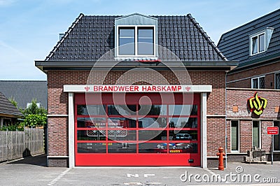 Harskamp, Gelderland, The Netherlands - Firefighter agency facade painted in red Editorial Stock Photo