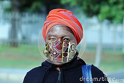 Black masked lady on the street Editorial Stock Photo