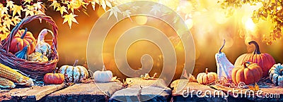 Harvest - Pumpkins And Corncobs On Wooden Table Stock Photo