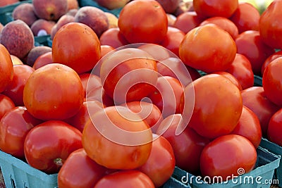 Harvest of tomatoes at farmers market Stock Photo