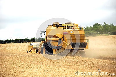 Harvester on field Stock Photo