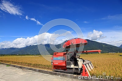 Harvesters on Paddy Field in Taidongï¼ŒTaiwan Editorial Stock Photo