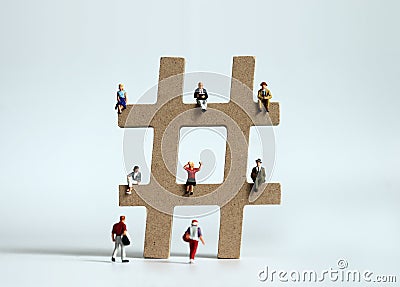 Hashtags and various miniature people. Stock Photo