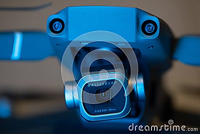 Hasselblad digital photo or video camera illuminated with blue light, the camera is mounted on the DJ Magic 2 Pro drone Editorial Stock Photo