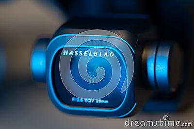 Hasselblad digital photo or video camera illuminated with blue light,the camera is mounted on a DJI Mavic 2 Pro drone Stock Photo