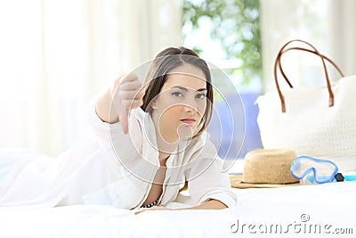 Hater angry hotel guest gesturing thumbs down Stock Photo