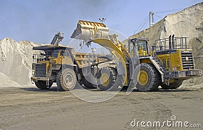 Hauler and loader action Stock Photo