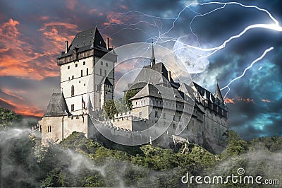 Haunted castle Karlstejn in storm Stock Photo