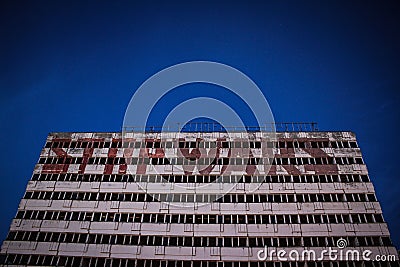 Haus der Statistik building with STOP WARS mural on blue sky background in Berlin, Germany Editorial Stock Photo