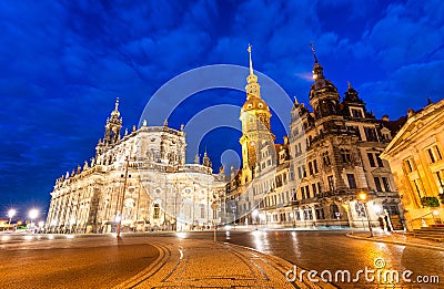 Hausmannsturm (Hausmann tower) of Residenzschloss (Royal Palace) and Katholische Hofkirche, Dresden, Saxony, Germany. Night Stock Photo