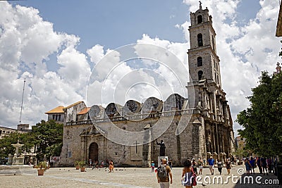 This the San Francisco church in the center of Havana in Cuba. There is the statue of San Francisco in the front of the church Editorial Stock Photo