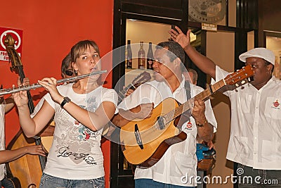 Musicians perform in bar Editorial Stock Photo