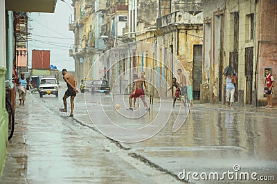 HAVANA, CUBA - MAY 31, 2013 Locan Cuban kids play football or so Editorial Stock Photo