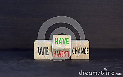 We have or not chance symbol. Concept word We have or have not chance on beautiful wooden cubes. Beautiful black table black Stock Photo