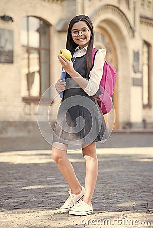 Have you had your break today. Little child hold apple outdoors. School break. Brain food. Healthy eating and snacking Stock Photo