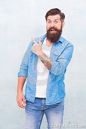 Have you seen this. Shopping promotion. Items for men. Good looking guy. Cheerful hipster. Promoting goods. Handsome man Stock Photo