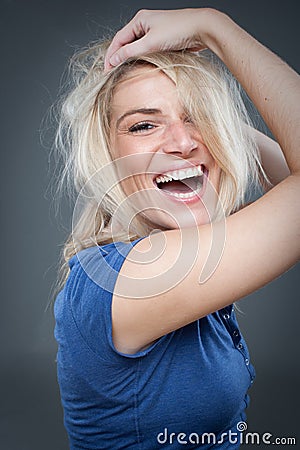 Laughing blond woman Stock Photo