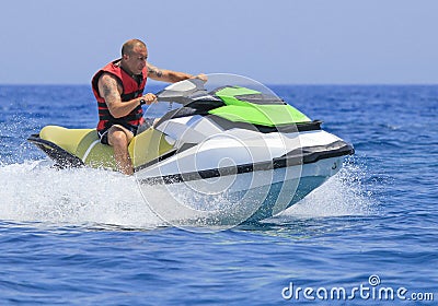 Having fun on a jet-ski Stock Photo