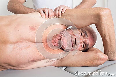 Having fun during physiotherapeutic treatment Stock Photo