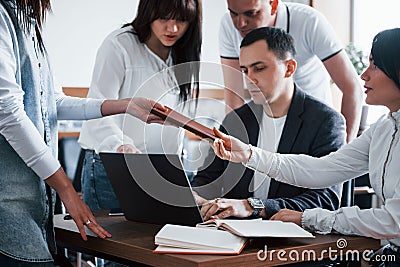 Having a meet. Business people and manager working on their new project in classroom Stock Photo