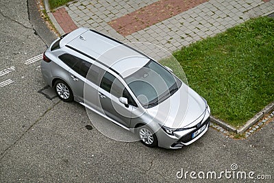 Toyota Corolla Touring Sports with hybrid HSD engine in top view Editorial Stock Photo