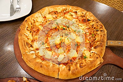 Hawaiian chicken pizza with pineapple. Delicious taste Stock Photo