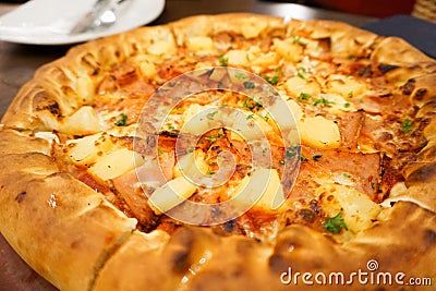 Hawaiian chicken pizza with pineapple. Delicious taste Stock Photo